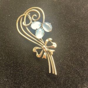 Vintage Symmetalic Sterling + 14k Floral pin w/ 3 blue moonstone cabochons.